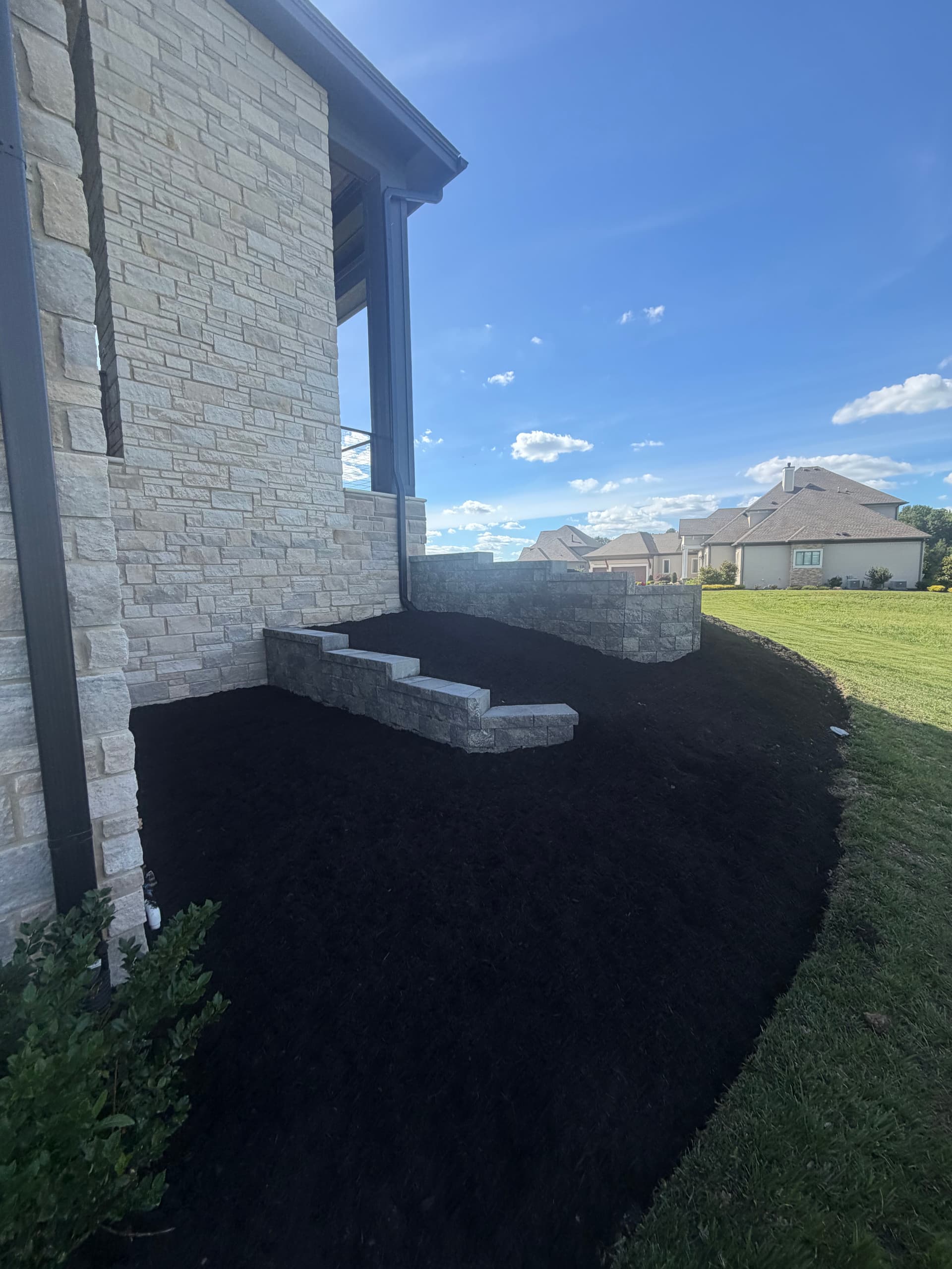 Gallery photos for Fresh Mulch and New Plantings on a Stunning Custom Home: Image #1
