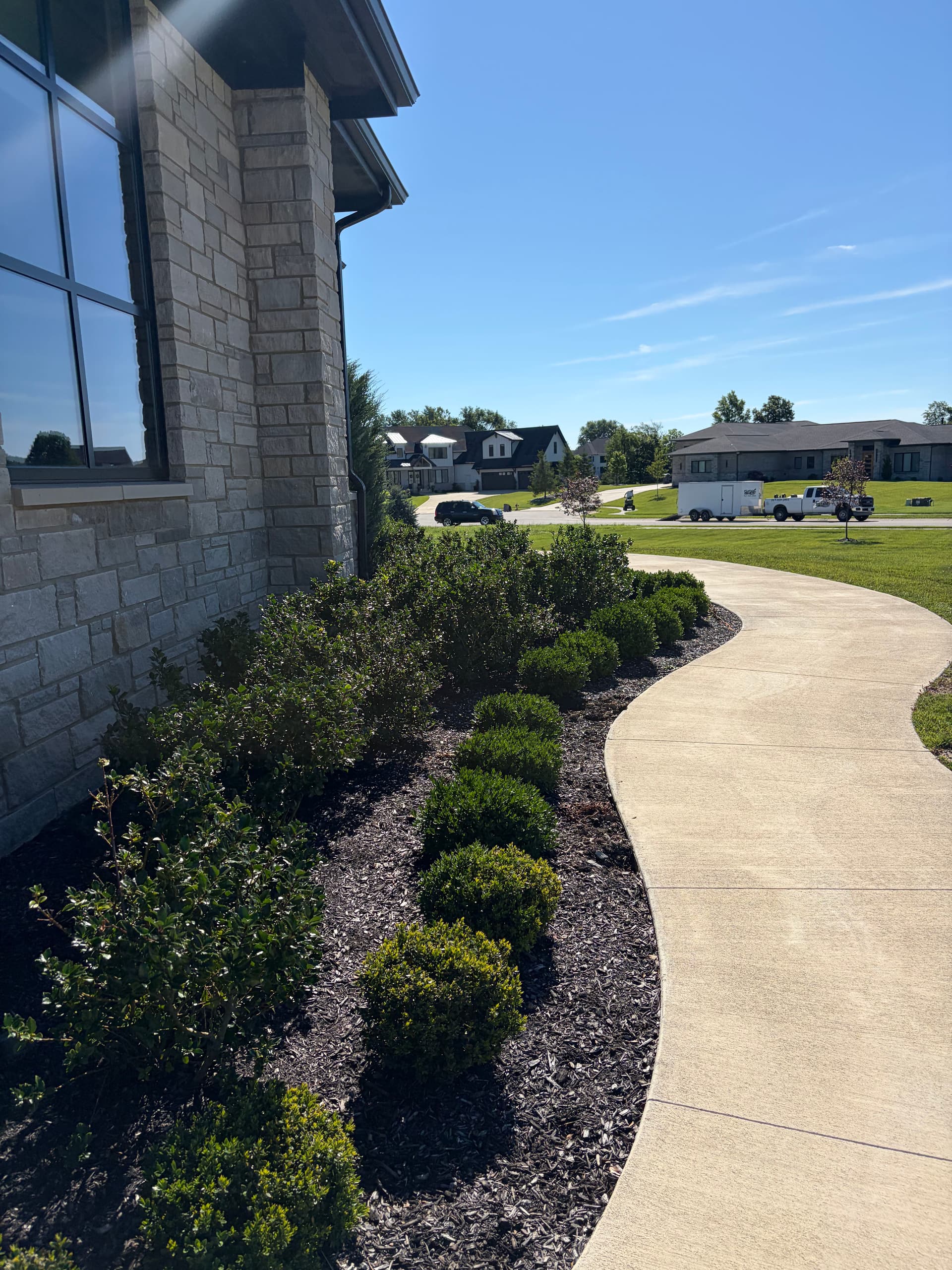 Gallery photos for Fresh Mulch and New Plantings on a Stunning Custom Home: Image #9