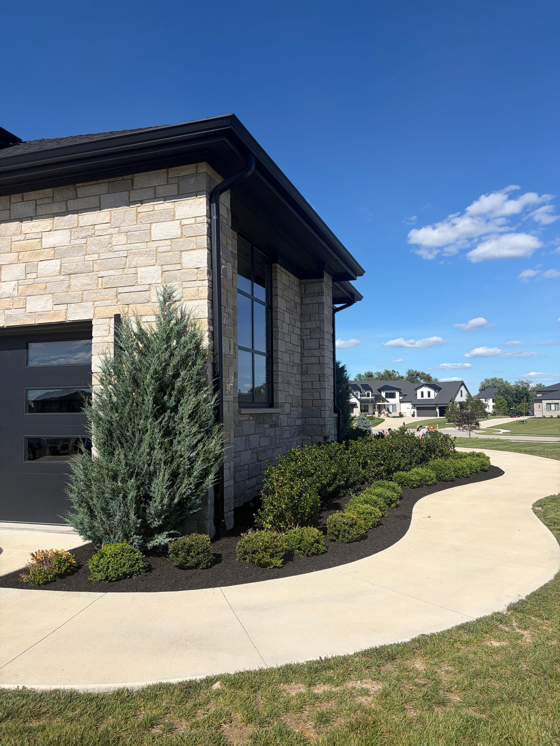 Gallery photos for Fresh Mulch and New Plantings on a Stunning Custom Home: Image #3