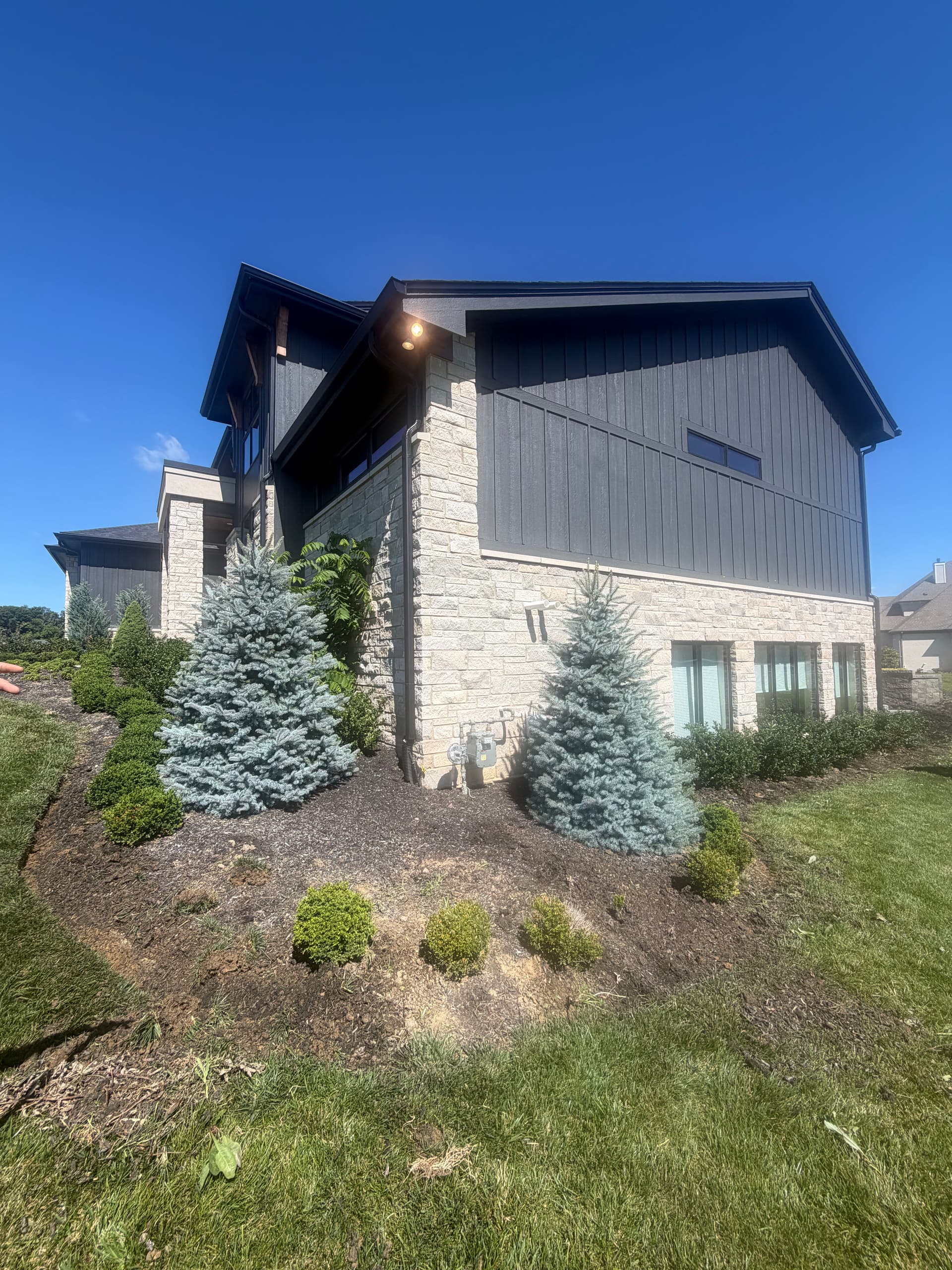 Gallery photos for Fresh Mulch and New Plantings on a Stunning Custom Home: Image #8