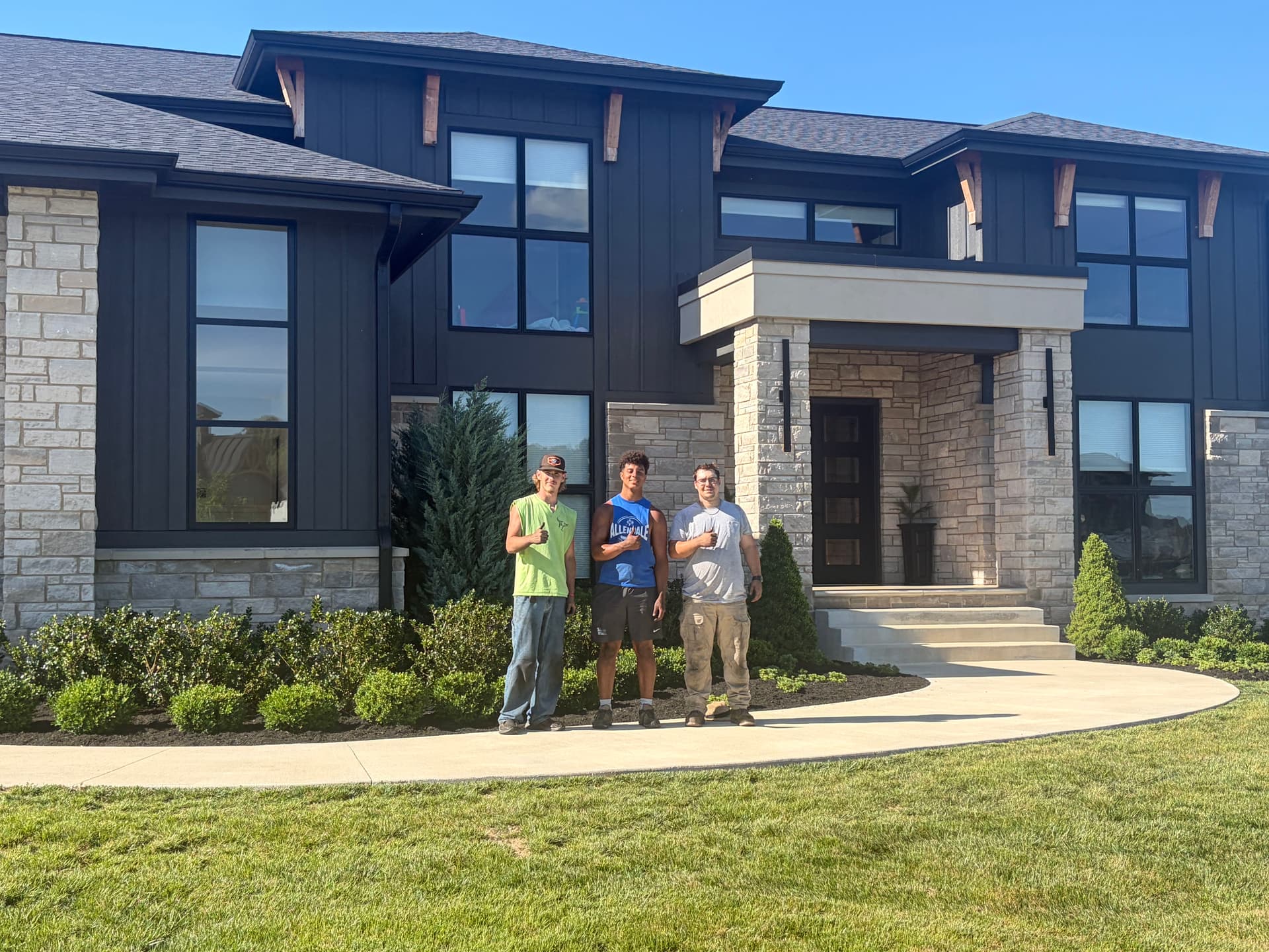 Fresh Mulch and New Plantings on a Stunning Custom Home image